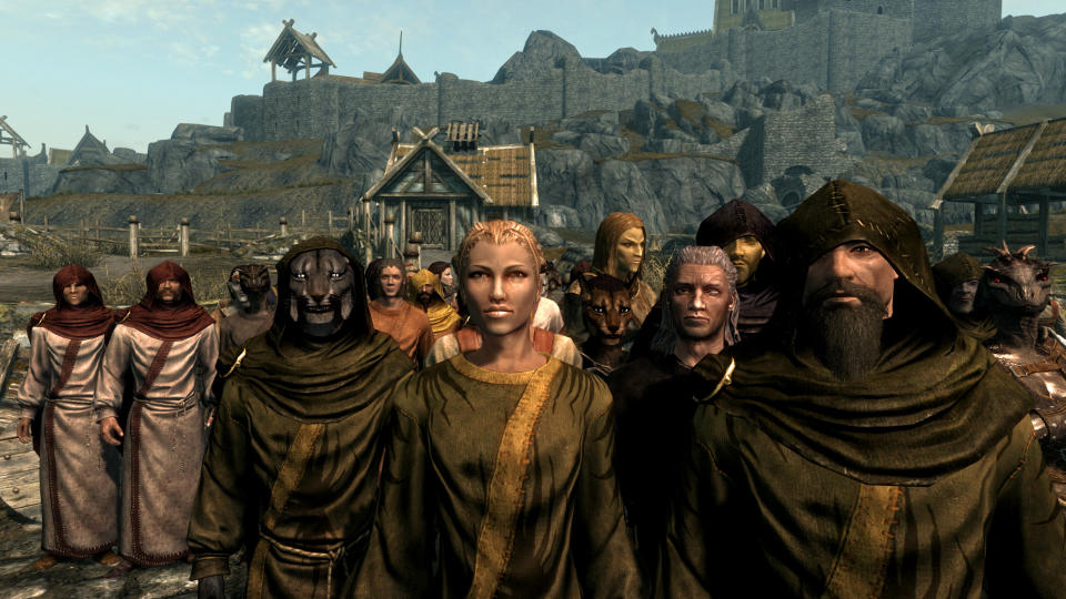 Best Skyrim mods — a mass of fellow travelers mill around the Whiterun stables.