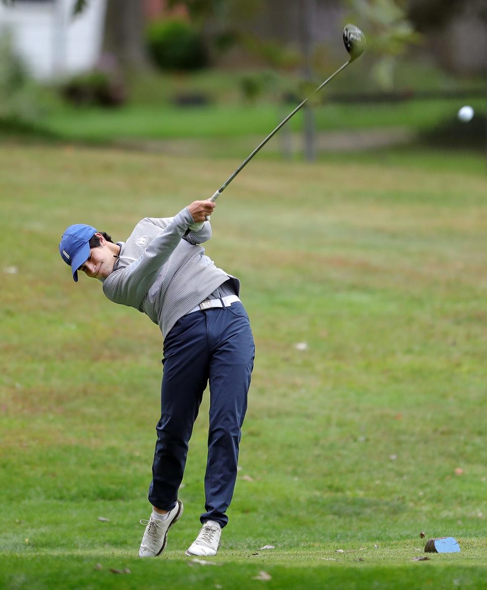 Hudson's Sam Fauver sends his ball down the 11th fairway during the Suburban League golf tournament at J.E. Good Park Golf Course, Thursday, Sept. 29, 2022, in Akron, Ohio.