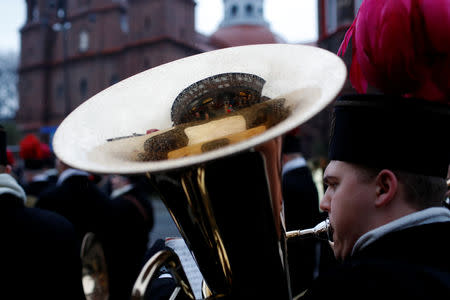 A miners' orchestra marches during the feast of St.Barbara, patron of coal miners, in the Nikiszowiec district of Katowice, Poland, December 4, 2018