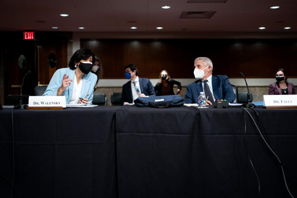 Dr Rochelle Walensky, Director of the Centers for Disease Control and Prevention, left, and Dr Anthony Fauci, director of the National Institute of Allergy and Infectious Diseases and chief medical adviser to the president (AP)