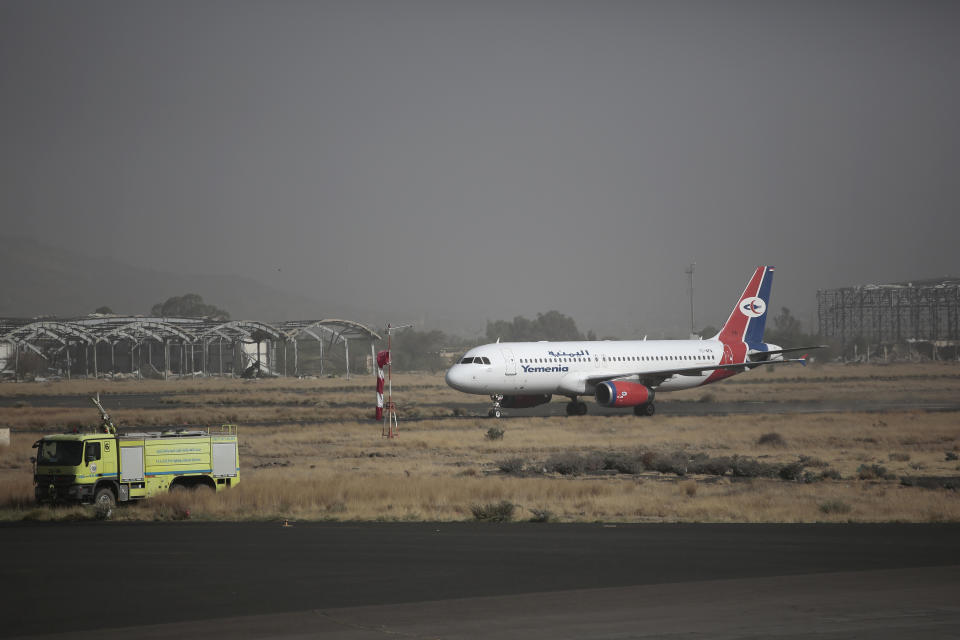 A Yemen Airways plane lands at the Sanaa international airport in Sanaa, Yemen, Monday, May, 16, 2022. The first commercial flight in six years took off from Yemen’s rebel-held capital on Monday, officials said, part of a fragile truce in the county’s grinding civil war. (AP Photo/Hani Mohammed)