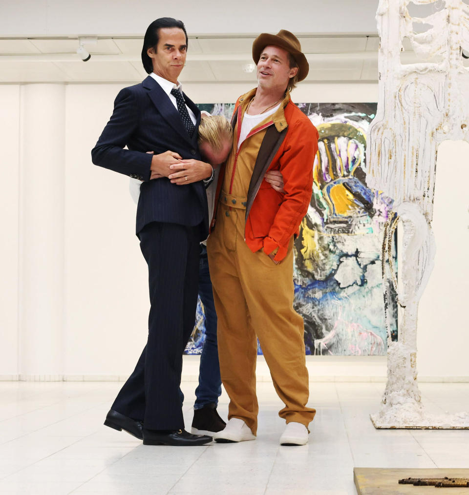 <p>Nick Cave and Brad Pitt celebrate their first art exhibition at Sara Hilden Art Museum in Tampere, Finland, on Sept. 17. </p>
