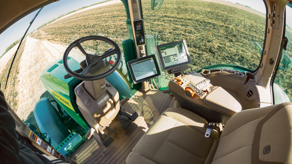 This 2021 photo provided by John Deere shows an autonomous tractor plowing a field, without a driver, on a farm in Blue Earth, Minn. (Bill Krzyzanowski/John Deere via AP)