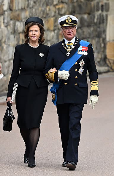 WINDSOR, ENGLAND - SEPTEMBER 19: Queen Silvia of Sweden and Carl XVI Gustaf King of Sweden arrive at the Committal Service for Queen Elizabeth II at Windsor Castle on September 19, 2022 in Windsor, England. The committal service at St George's Chapel, Windsor Castle, took place following the state funeral at Westminster Abbey. A private burial in The King George VI Memorial Chapel followed. Queen Elizabeth II died at Balmoral Castle in Scotland on September 8, 2022, and is succeeded by her eldest son, King Charles III. (Photo by Leon Neal/Getty Images)