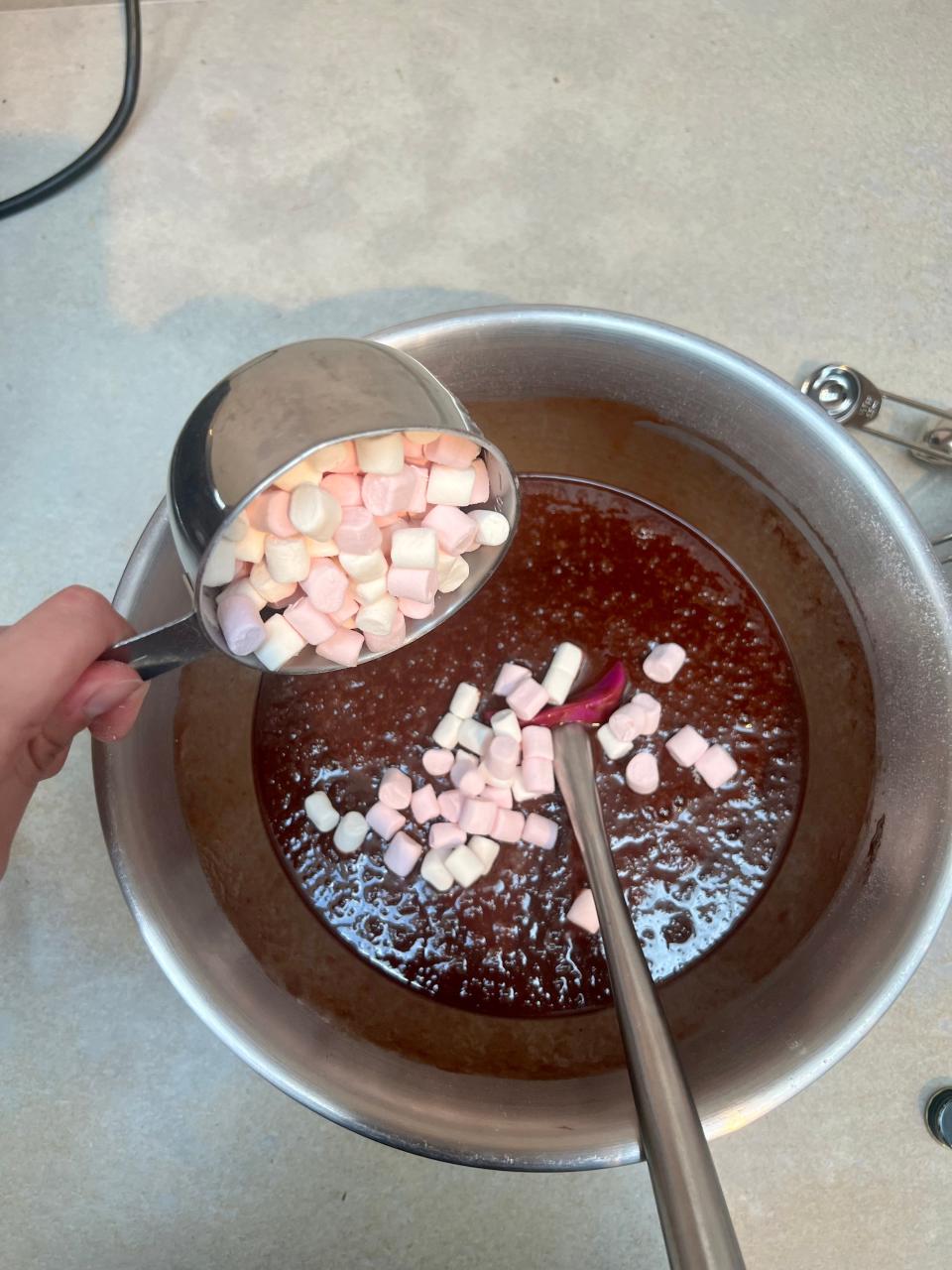 The final ingredient of the batter is tiny marshmallows.
