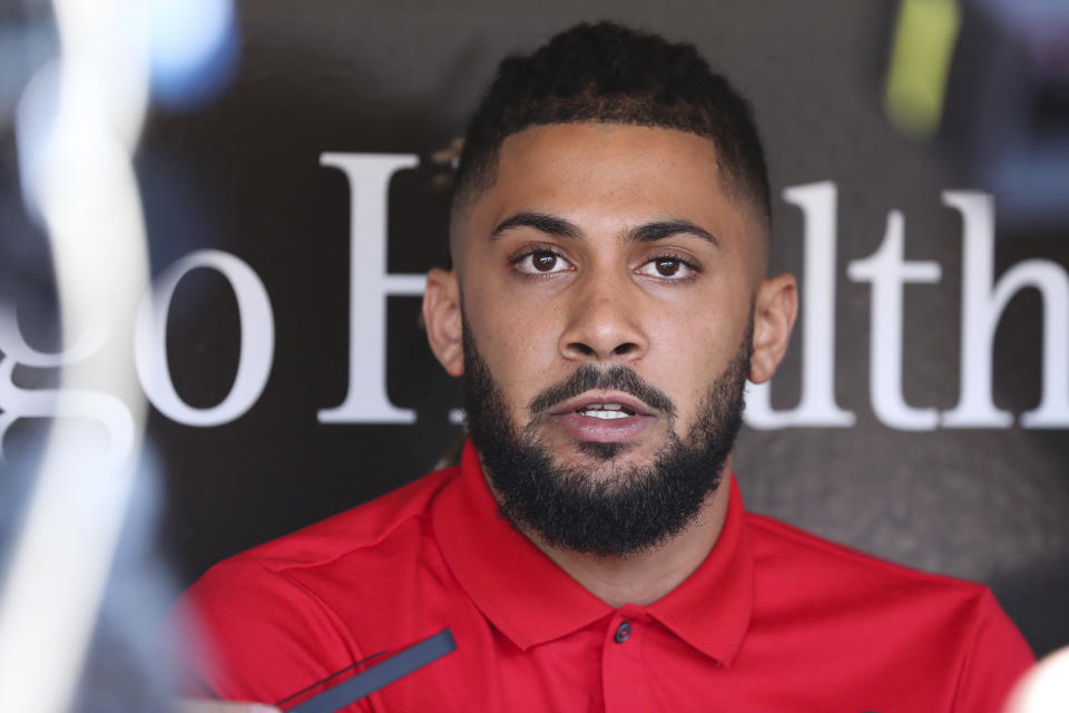 San Diego Padres' Fernando Tatis Jr. speaks to the media about his 80 game suspension from baseball after testing positive for Clostebol, a performance-enhancing substance in violation of Major League Baseball's Joint Drug Prevention and Treatment Program, Tuesday, Aug. 23, 2022, in San Diego. (AP Photo/Derrick Tuskan)