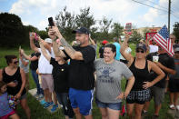 <p>Residents of the Pearland, Texas area watch as President Donald Trump’s motorcade leaves the First Church of Pearland September 2, 2017 in Pearland, Texas. (Photo: Win McNamee/Getty Images) </p>