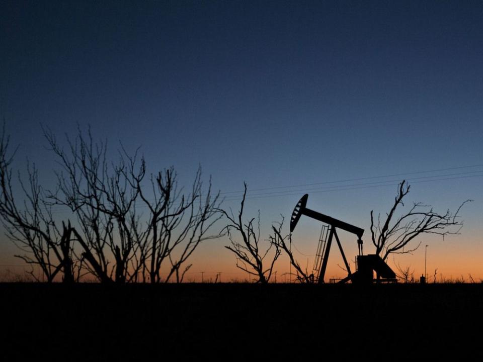  The silhouette of a pumpjack is seen at dusk in the Permian Basin near Midland, Texas. Diamondback Energy Inc. reached an agreement to buy fellow Texas oil-and-gas producer Endeavor Energy through a US$26-billion deal.