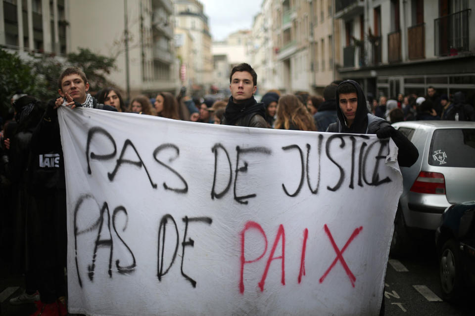 <p>Students hold a banner reading “No justice, No peace” during a protest against police violence, in Paris, Feb. 28, 2017. Tuesday’s protests mark the latest unrest prompted by the alleged police rape of a young black man earlier this month, which crystalized anger at what protesters say is routine police abuse and discrimination. (AP Photo/Thibault Camus) </p>