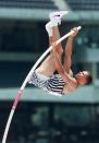 Dan O'Brien from Moscow, Idaho, goes up and clears the bar at 5.10 meters during the decathlon pole vault event at the Olympic team trials in Atlanta Saturday, June 22, 1996. (AP Photo/Doug Mills)