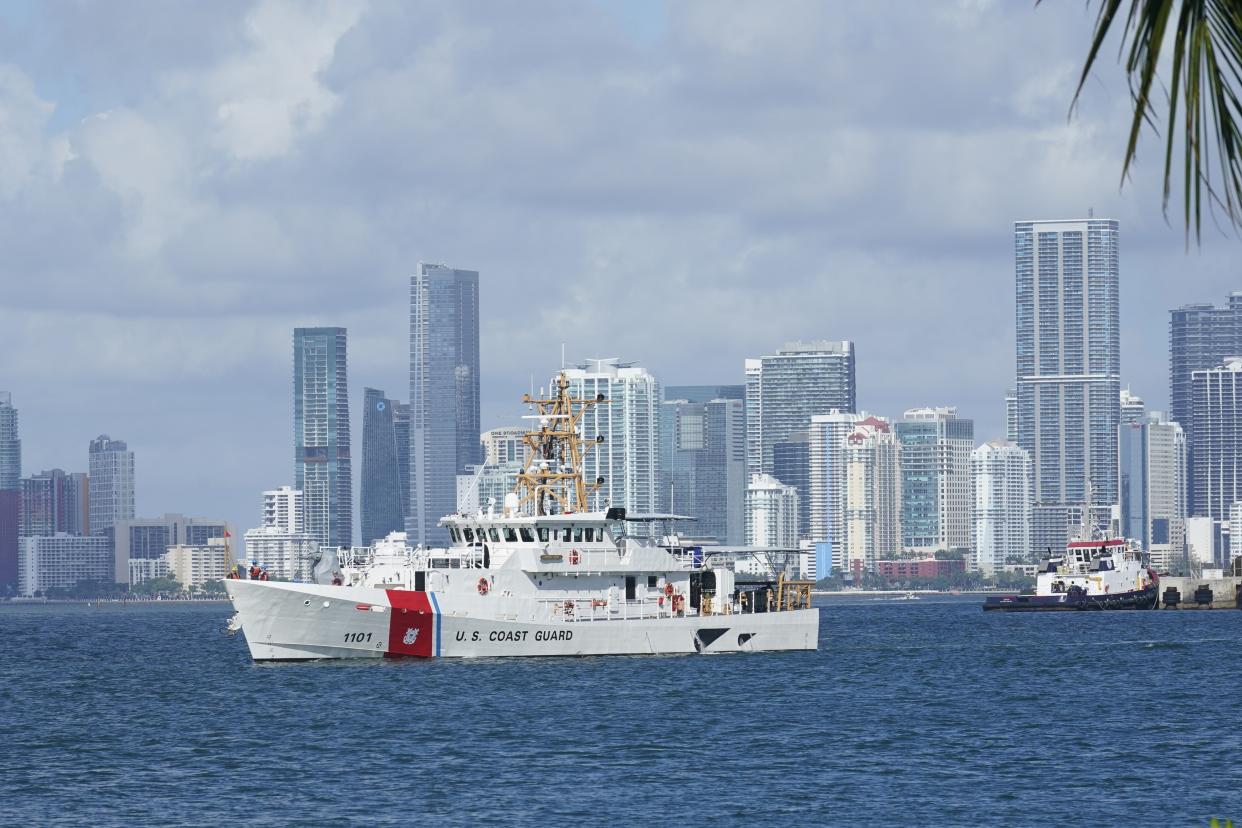 The U.S. Coast Guard is searching for 39 people after a good Samaritan rescued a man clinging to a boat off the coast of Florida. (AP Photo/Marta Lavandier)