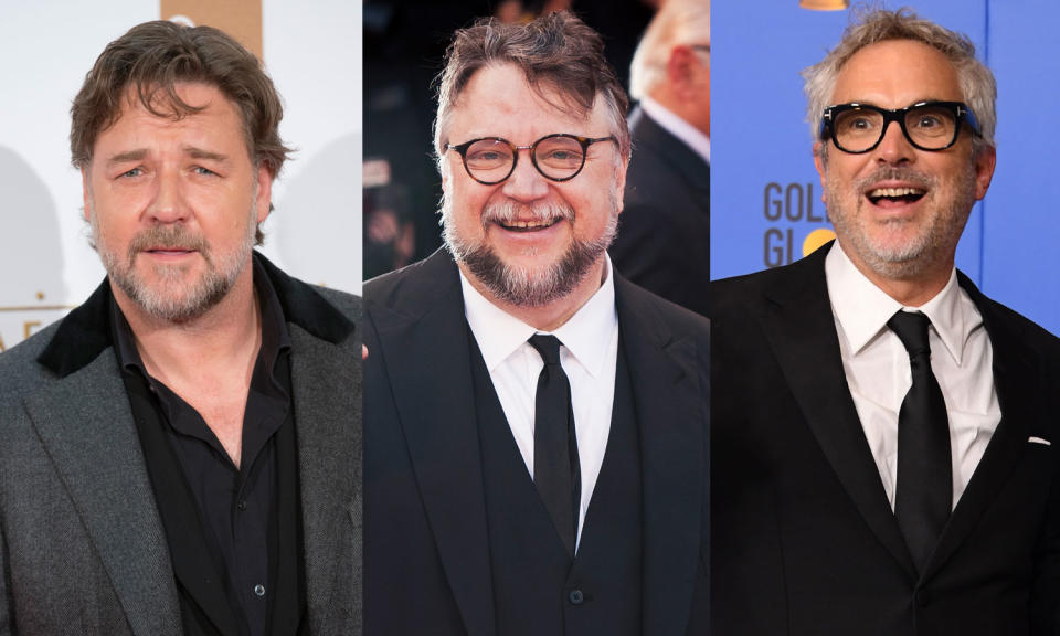 Russell Crowe, Guillermo del Toro and Alfonso Cuarón are disappointed in some Oscars being handed out during a commercial break. Many others are speaking out. (Photo: Getty Images)