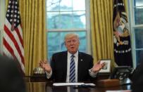 U.S. President Donald Trump speaks during an interview with Reuters in the Oval Office of the White House in Washington, U.S., April 27, 2017. REUTERS/Carlos Barria