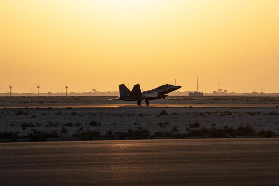 In this photo released by the U.S. Air Force, a U.S. Air Force F-22 Raptor arrives at Al-Dhafra Air Base in Abu Dhabi, United Arab Emirates, Saturday, Feb. 12, 2022. U.S. F-22 fighter jets arrived in the United Arab Emirates on Saturday, part of an American defense response to recent missile attacks by Yemen's Houthi rebels targeting the country. (Tech Sgt. Chelsea E. FitzPatrick/U.S. Air Force via AP)