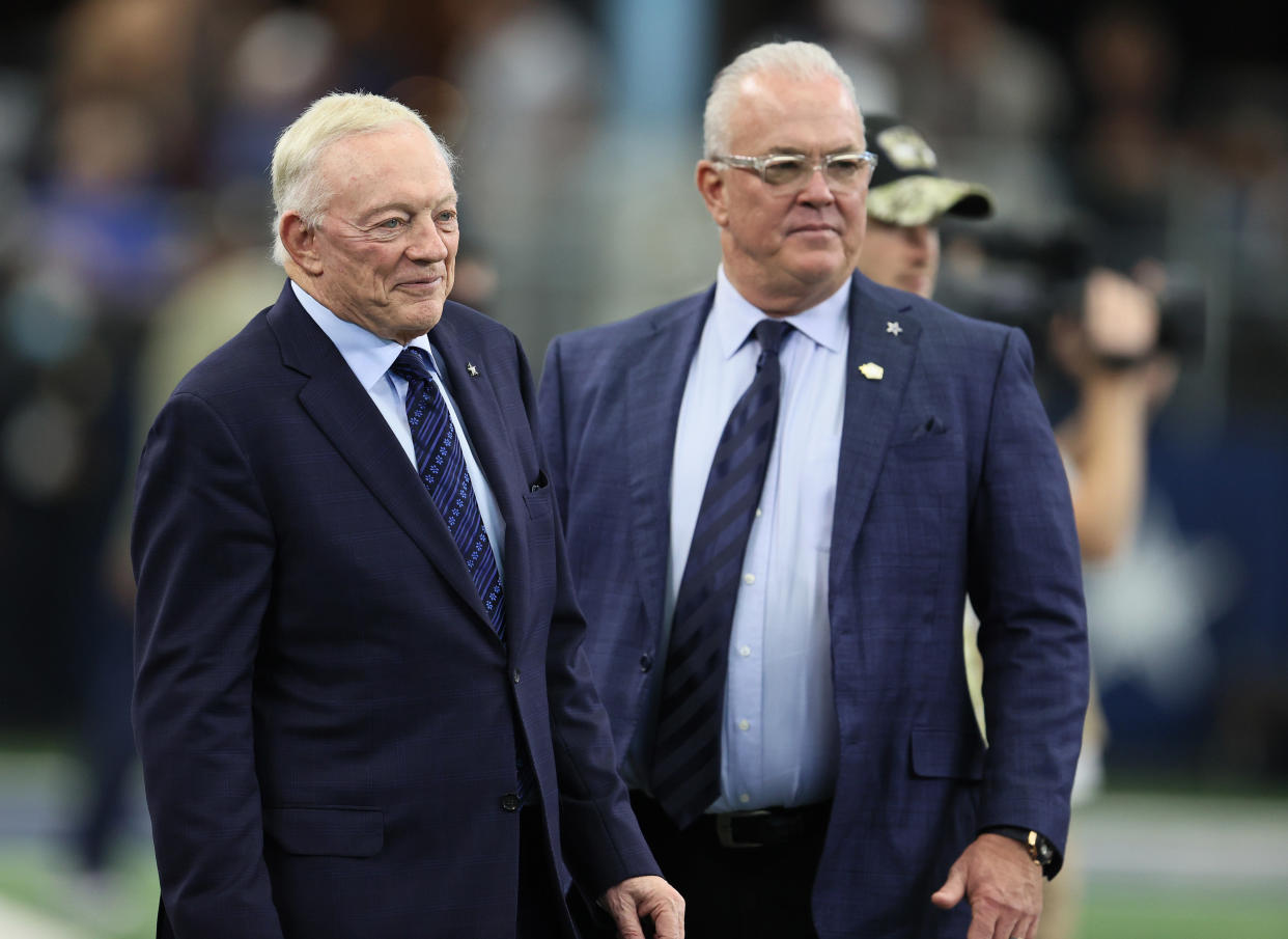 Dallas Cowboys owner Jerry Jones with his son Stephen Jones on the field prior to the game against the Denver Broncos at AT&T Stadium. Mandatory Credit: Matthew Emmons-USA TODAY Sports