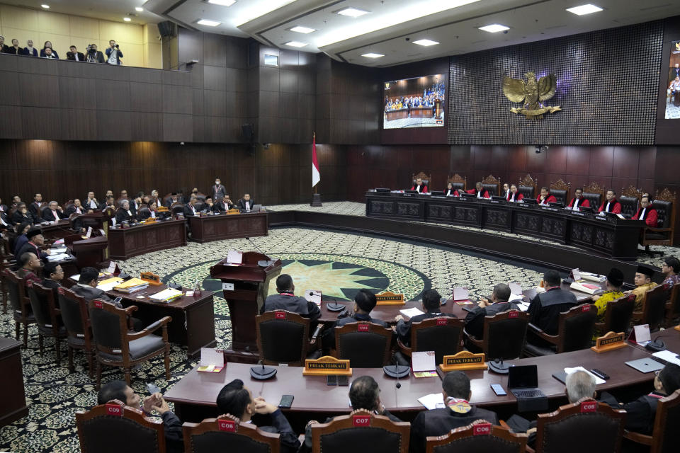 Judges preside over a hearing on the presidential election result dispute at the Constitutional Court in Jakarta, Indonesia, Friday, April 5, 2024. (AP Photo/Dita Alangkara)