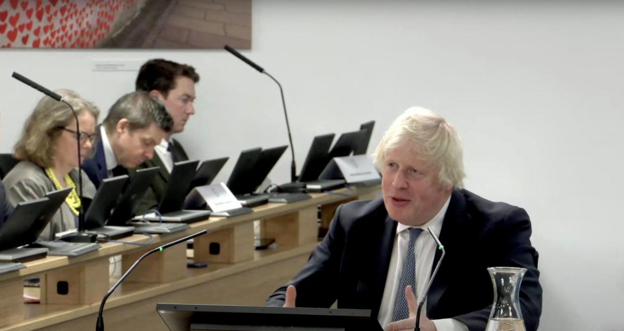 Former British Prime Minister Boris Johnson gives evidence at the Covid Inquiry in London on Thursday (via REUTERS)