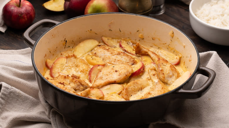 Chicken cutlets and apples in a Dutch oven