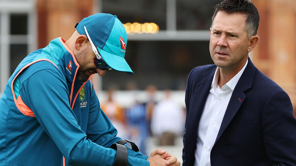 Ricky Ponting is pictured in conversation with Australian spinner Nathan Lyon.