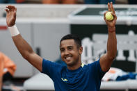 Bolivia's Hugo Dellien celebrates defeating Austria's Dominic Thiem in three sets, 6-3, 6-2, 6-4, in their first round match at the French Open tennis tournament in Roland Garros stadium in Paris, France, Sunday, May 22, 2022. (AP Photo/Thibault Camus)
