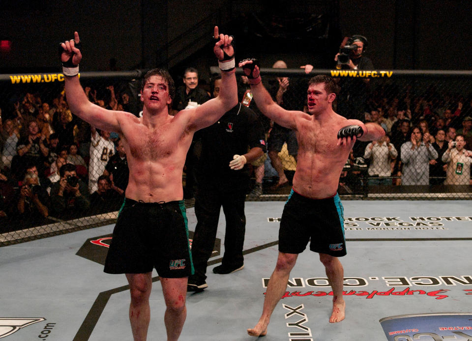 LAS VEGAS, NV - APRIL 09:  (L-R) Stephan Bonnar and Forrest Griffin react after their historic three-round battle during the Light Heavyweight Final bout during the live Ultimate Fighter Season Finale at the Cox Pavilion on April 9, 2005 in Las Vegas, Nevada.  (Photo by Josh Hedges/Zuffa LLC/Zuffa LLC via Getty Images)