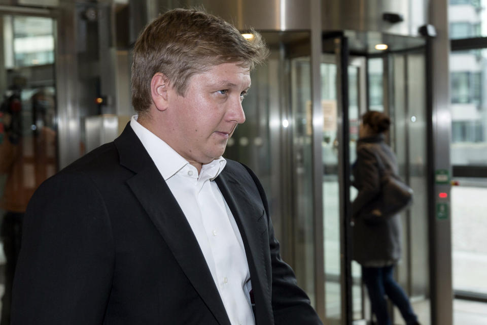 FILE - In this Sept. 25, 2015, file photo, chief executive officer of Naftogaz, Andriy Kobolyev, left, arrives at EU headquarters in Brussels. Federal prosecutors have interviewed the head of Ukraine’s state-owned gas company as part of an ongoing probe into the business dealings of Rudy Giuliani and two of his Soviet-born business associates. (AP Photo/Thierry Monasse, File)