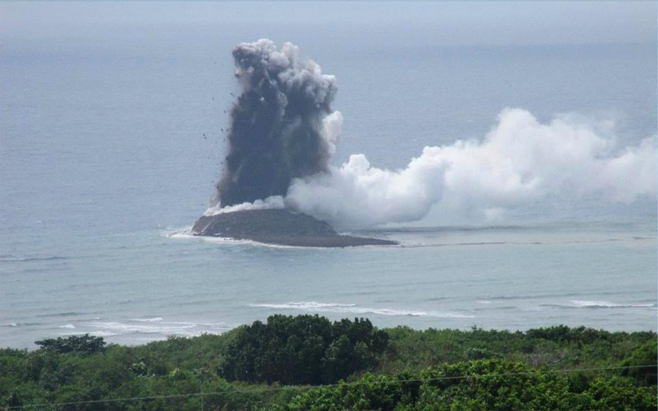 In this photo provided by the Japan Maritime Self-Defense Force, steam billows from the waters off Ioto island, Ogasawara town in the Pacific Ocean, southern Tokyo (AP)