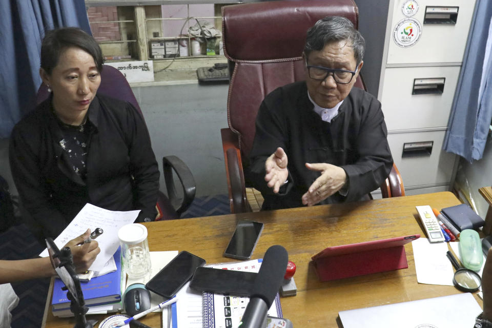 Khin Maung Zaw, right, with Min Min Soe, left, the lawyers assigned by the National League for Democracy party to represent deposed Myanmar leader Aung San Suu Kyi, speaks to journalists in Naypyitaw, Myanmar, Myanmar, Monday, May 24, 2021. Myanmar’s ousted leader, Aung San Suu Kyi, appeared in court in person Monday for the first time since the military arrested her when it seized power on Feb. 1. (AP Photo)