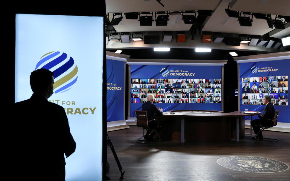 U.S. President Joe Biden and U.S Secretary of State Antony Blinken attend a virtual summit with leaders from democratic nations at the State Department's Summit for Democracy, at the White House, in Washington, U.S. December 9, 2021. REUTERS/Leah Millis