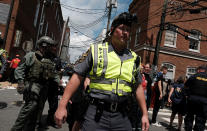 <p>Police respond after a car drove through a group of counter protesters at the “Unite the Right” rally Charlottesville, Va., Aug. 12, 2017. (Photo: Justin Ide/Reuters) </p>