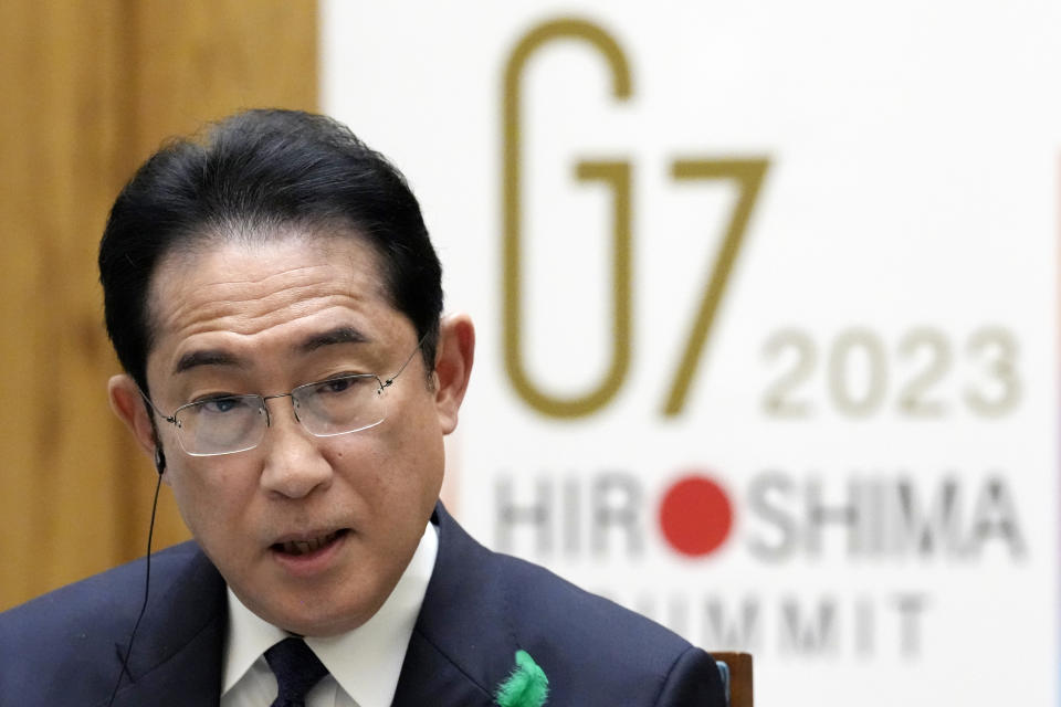 FILE - Japan's Prime Minister Fumio Kishida listens to a question from a foreign journalist during an interview with foreign media members at the prime minister's office in Tokyo, April 20, 2023. Leaders of the Group of Seven advanced economies are generally united in voicing concern about China. The question is how to translate that worry into action. (AP Photo/Eugene Hoshiko, File)