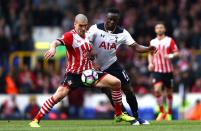 <p>Wanyama and Romeu clash in midfield </p>