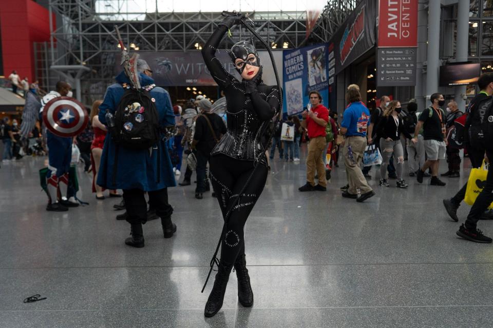 A cosplayer dressed as Michelle Pfeiffer's Catwoman at New York Comic Con 2021.