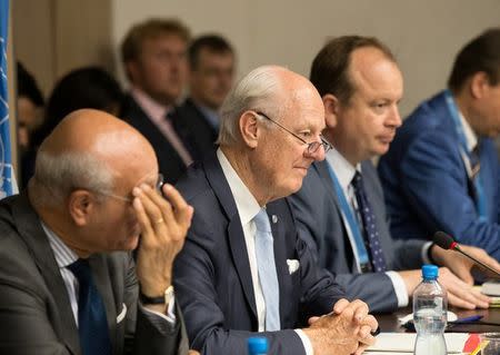 UN Special Envoy of the Secretary-General for Syria Staffan de Mistura attends a new round of negotiation with Syria's main opposition High Negotiations Committee (HNC) leader Nasr al-Hariri (not pictured) during the Intra Syria talks, at Palais des Nations in Geneva, Switzerland July 14, 2017. REUTERS/Xu Jinquan/Pool