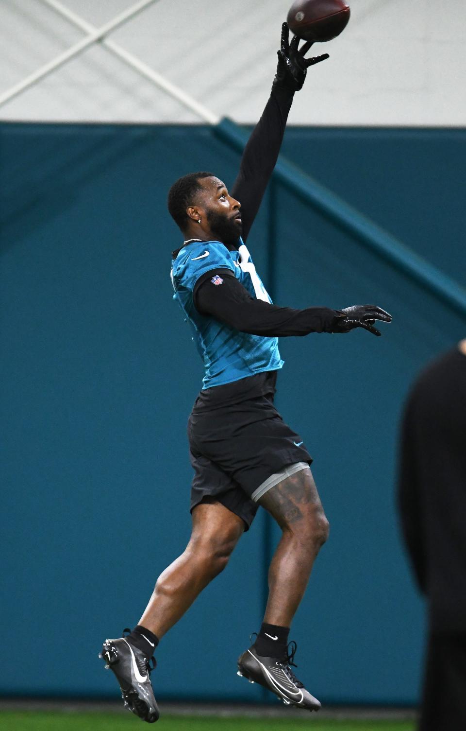 Jacksonville Jaguars wide receiver Jarvis Landry (6) pulls stretches for an overthrown pass during Friday's rookie minicamp session. The Jacksonville Jaguars held their first day of rookie minicamp inside the covered field at the Jaguars performance facility in Jacksonville, Florida Friday, May 10, 2024.