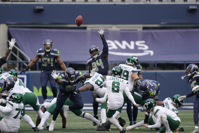 Russell Wilson throws four TDs as Seattle Seahawks rout winless N.Y. Jets