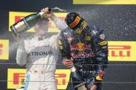 Hungary Formula One - F1 - Hungarian Grand Prix 2016 - Hungaroring, Hungary - 24/7/16 Mercedes' Nico Rosberg and Red Bull Racing's Daniel Ricciardo celebrate after the race REUTERS/Laszlo Balogh