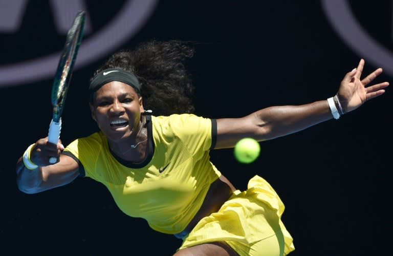 Serena Williams of the US plays a forehand return during her women's singles match against Taiwan's Hsieh Su-Wei on day three of the Australian Open, on January 20, 2016