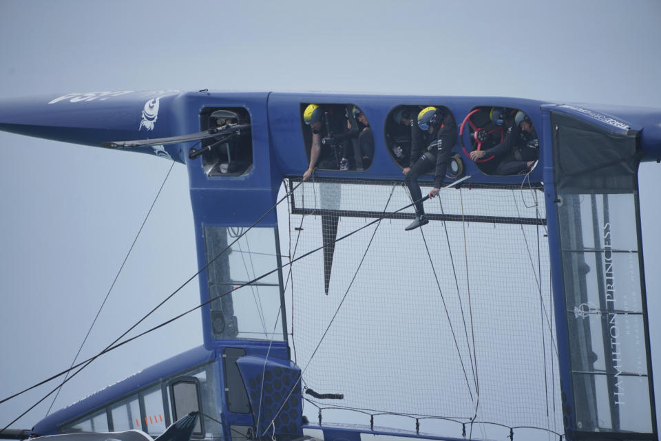 In this Friday, April 16, 2021, photo provided by SailGP, Australia''s SailGP team capsizes on Bermuda's Great Sound while practicing for the season opener. The Australian SailGP team capsized during a water-trial on-board rival Team United States's wing-sailed F50 foiling catamaran. No injuries were sustained, according to SailGP. (Ugo Fonolla/SailGP via AP)