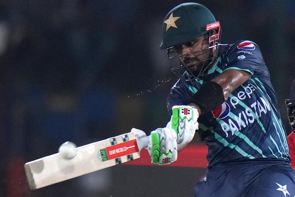 Pakistan's captain Babar Azam plays a shot during the second T20 cricket match between Pakistan and England, in Karachi, Pakistan, Thursday, Sept. 22, 2022. (AP Photo/Anjum Naveed)