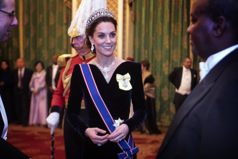 The Duchess of Cambridge attends a reception at Buckingham Palace.