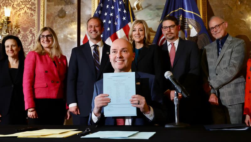 Gov. Spencer Cox poses for a photo after signing HB311 Social Media Usage Amendments at the Capitol in Salt Lake City on Thursday. The action marks the nation’s first major social media regulations becoming law. 