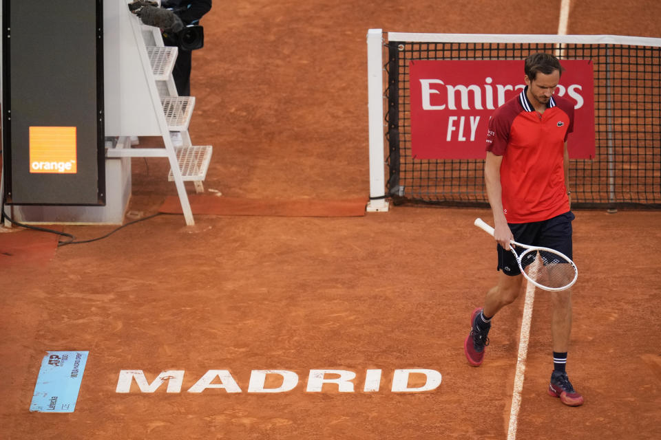 Daniil Medvedev of Russia walks past the net during the Mutua Madrid Open tennis tournament against Jiri Lehecka of the Czech Republic in Madrid, Spain, Thursday, May 2, 2024. (AP Photo/Manu Fernandez)