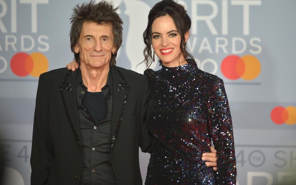 Ronnie Wood with his wife, Sally Humphreys, last year - Getty