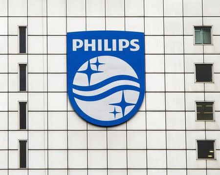 A Philips logo is seen at Philips headquarters, where Philips CEO Frans van Houten gave a presentation of the company's 2013 full-year results, in Amsterdam January 28, 2014. REUTERS/Toussaint Kluiters/United Photos