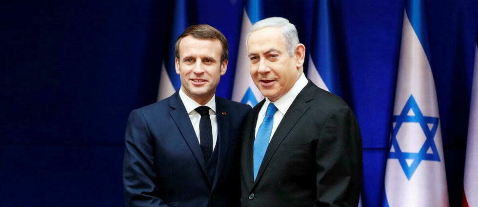 Emmanuel Macron et le Premier ministre israëlien Benyamin Netanyahou à l'Élysée ce jeudi soir.  - Credit:RONEN ZVULUN / POOL / AFP