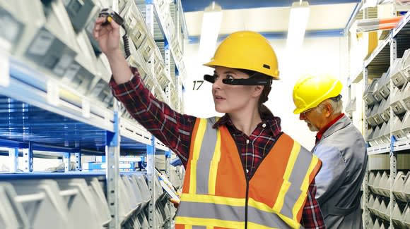 Warehouse worker wearing Vuzix smart glasses