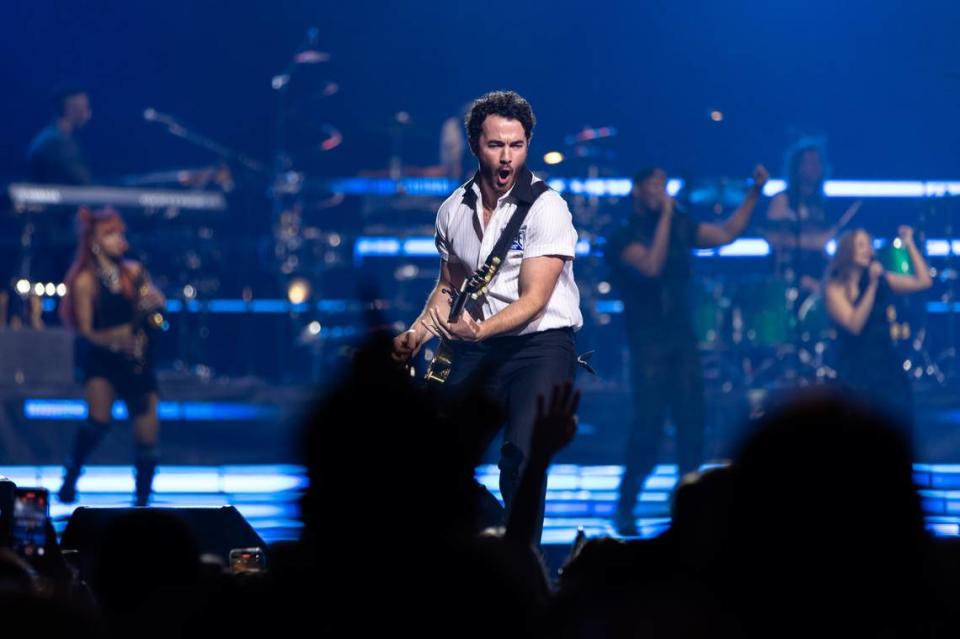 Kevin Jonas plays “What a Man Gotta Do” on guitar during The Jonas Brothers performance at the Spectrum Center in Charlotte, North Carolina on September 30, 2023.