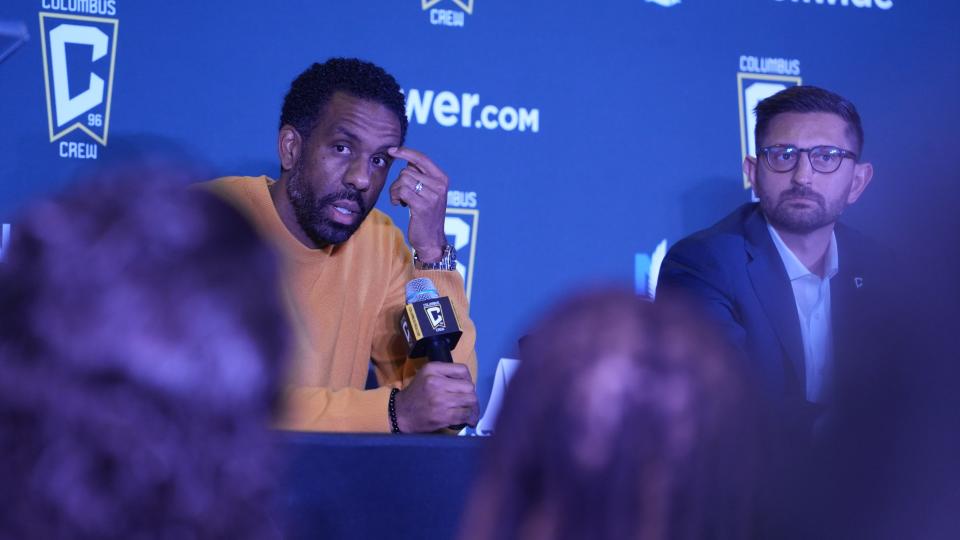 Wilfried Nancy  talks with the media as he is introduced as new coach of the Columbus Crew at Huntington Field Club at Lower.com Field December 6, 2022. At right is President and General Manager Tim Bezbatchenko.