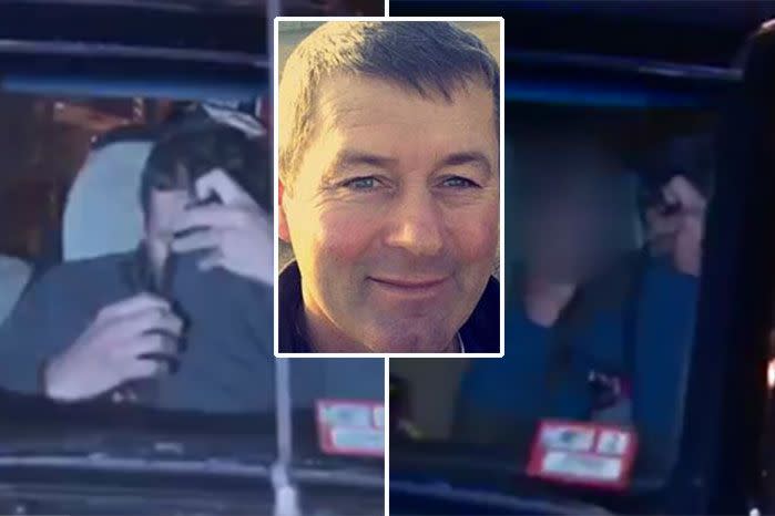 Mark Tromp gave media the finger as he was driven out of a police station. Photo: 7 News.